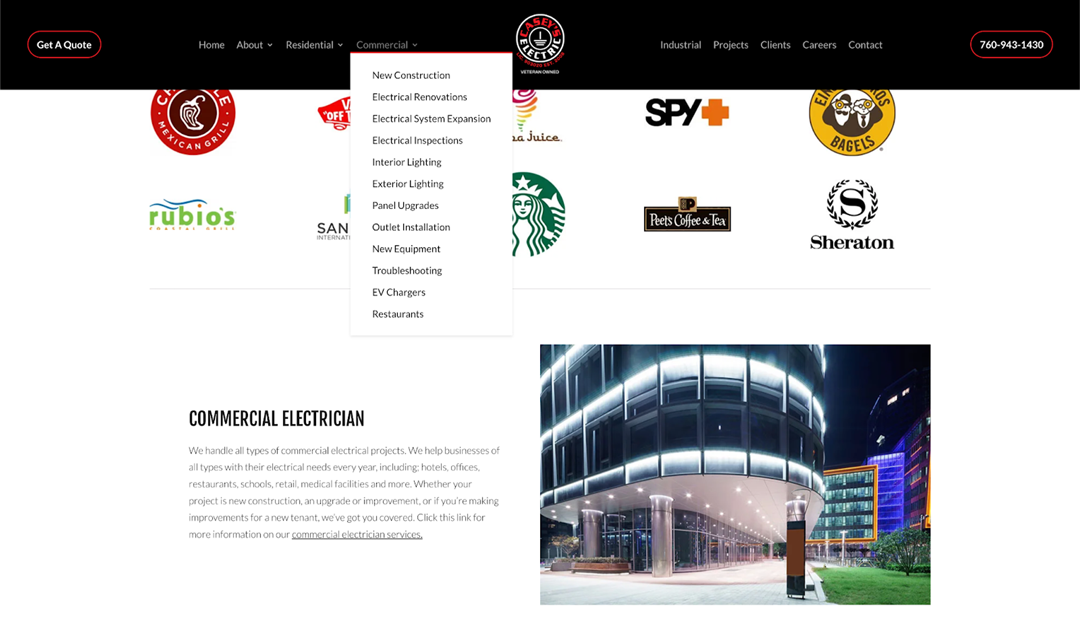 Screenshot of a commercial electrician's website. The menu is open, displaying electrical services. Various business logos are shown, and there is an image of a lit building facade at the bottom.